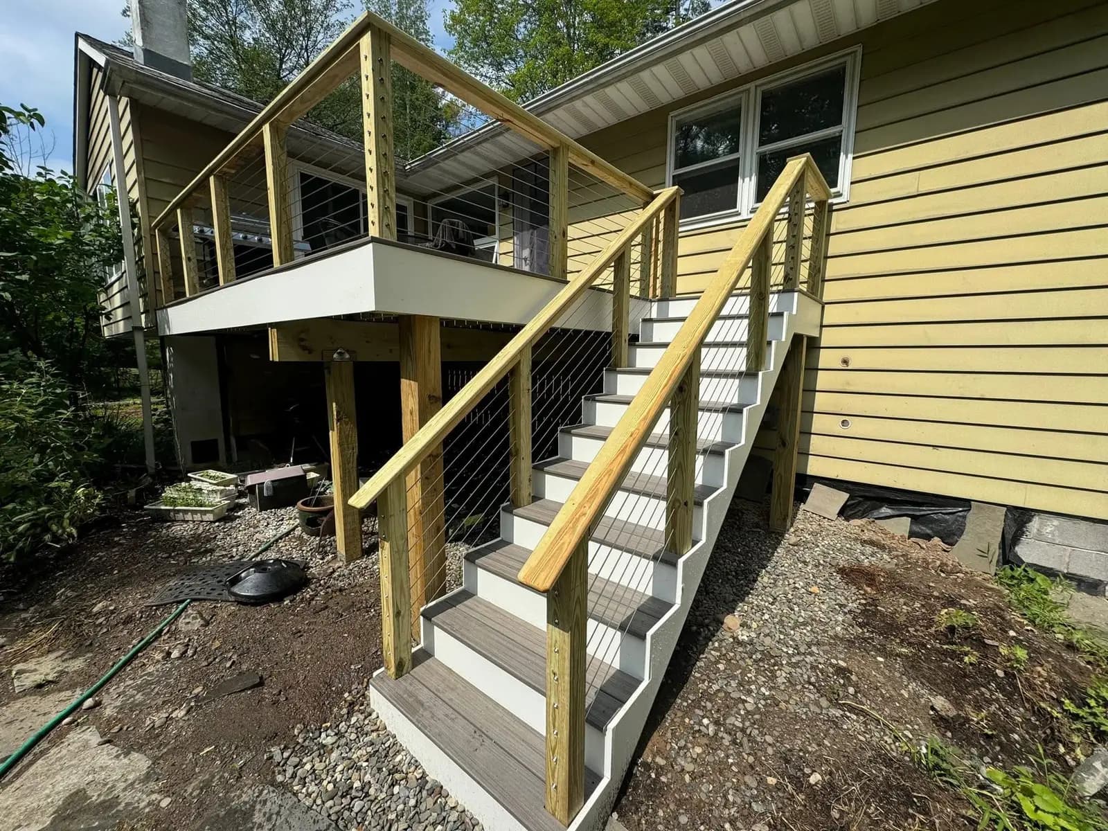 Woodstock-Inspired Composite Deck with Wood Handrails — image 2 of 3