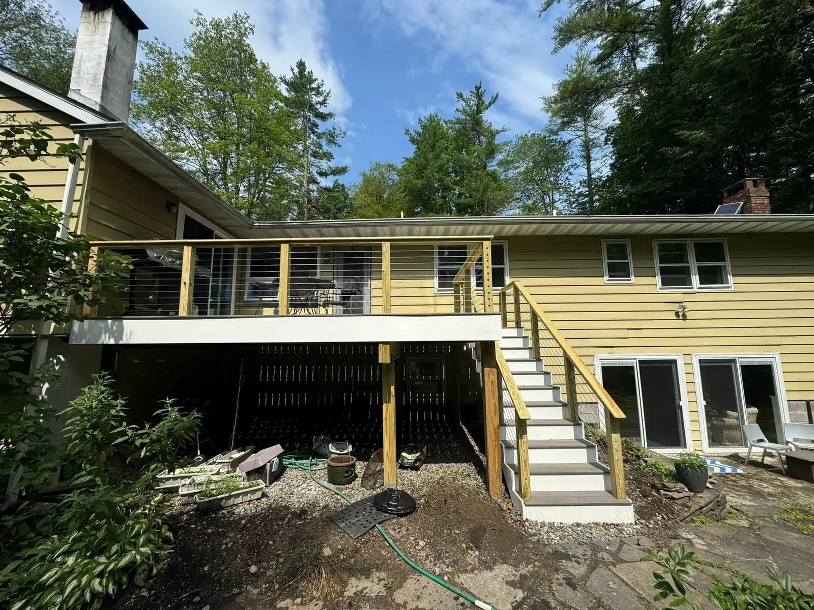 Woodstock-Inspired Composite Deck with Wood Handrails — image 3 of 3