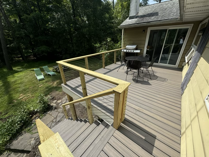 Woodstock-Inspired Composite Deck with Wood Handrails